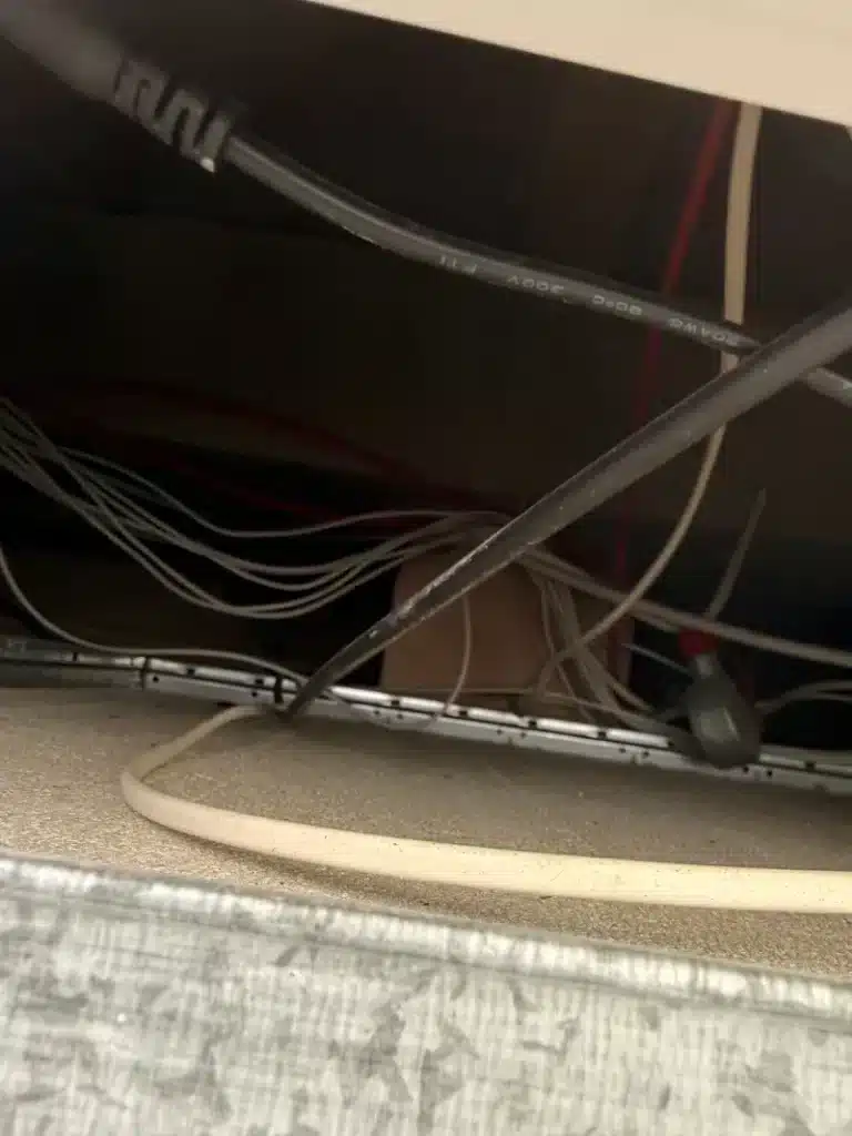 Concealed cabling above the suspended ceiling.